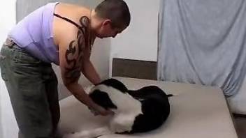 Buzzcut sporting MILF gets banged by a big-dicked dog
