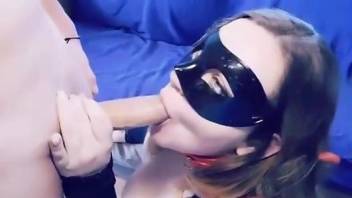 Masked MILF works the dog dick along with her man's