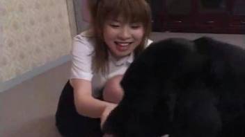 Cute Japanese chick with nice face gets hardly banged by her dog