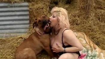 Hayloft is a perfect place for oral bestiality with a dog