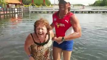 Elderly woman receives non-penetrative thrusting from a highly aroused dolphin