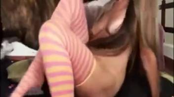 Perverted slut in knee-high stockings relishes steamy bestiality with a canine