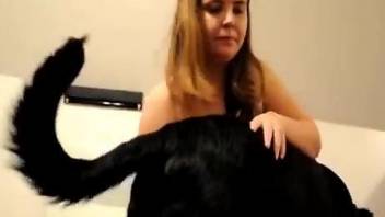 Sexy-looking chubby lady enjoys a dog's hot cock