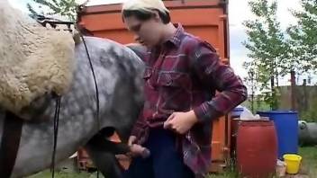 Blonde mature with big tits, soft outdoor blowjob on a horse dick