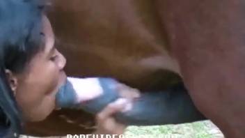 Hispanic woman in white undresses completely before having sex with a horse