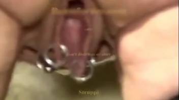 Older woman attempts massive equine penis in her pierced vagina