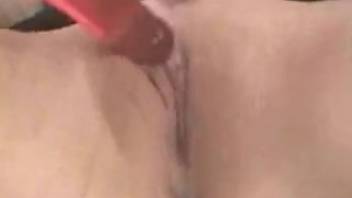 Intimate bestiality footage showing a woman pleasuring herself intensely